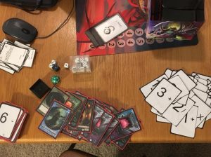 Unsleeving an old card prototype that was thin printed paper cards in front of old trading cards. I'm making room for Memaws Monsters Tower Defense Game prototype by Calvin Keene