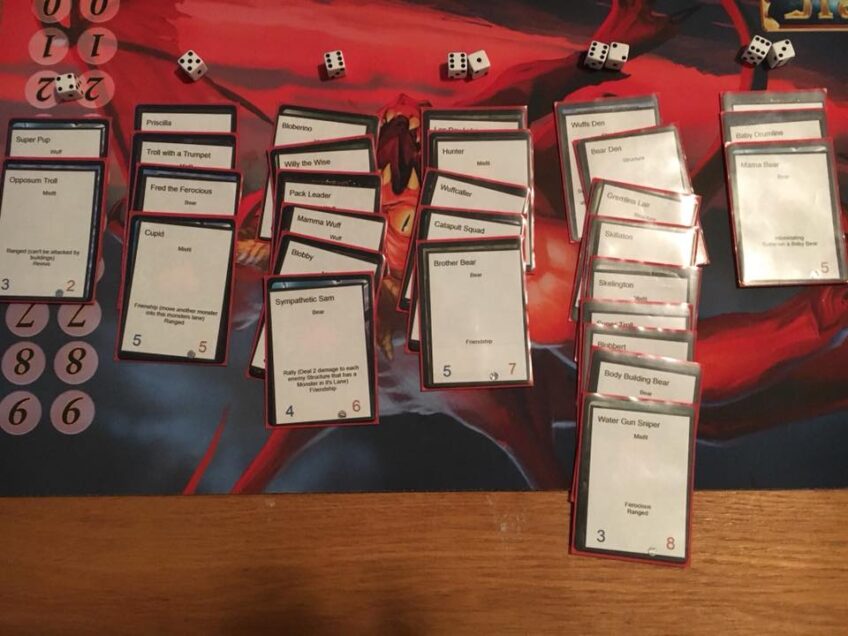 About 40 cards on the table in 6 columns showing off new monster cards for Memaws Monsters Tower Defense Game by Calvin Keeney